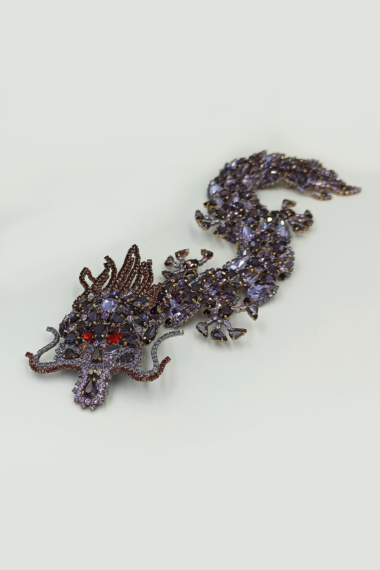 Handmade rhinestone brooch with a purple Chinese dragon