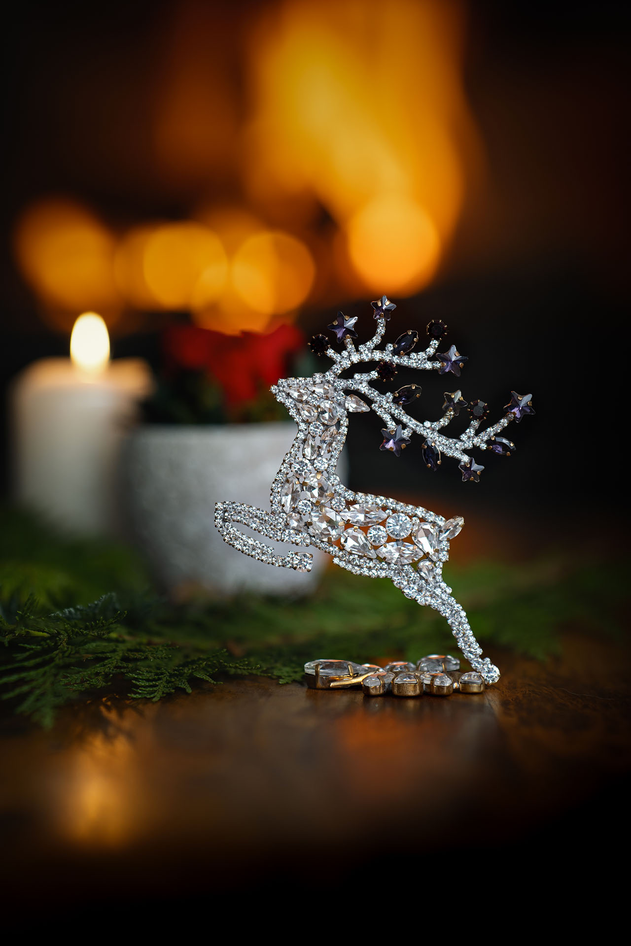 Decorative reindeer figurine with clear rhinestones - facing left