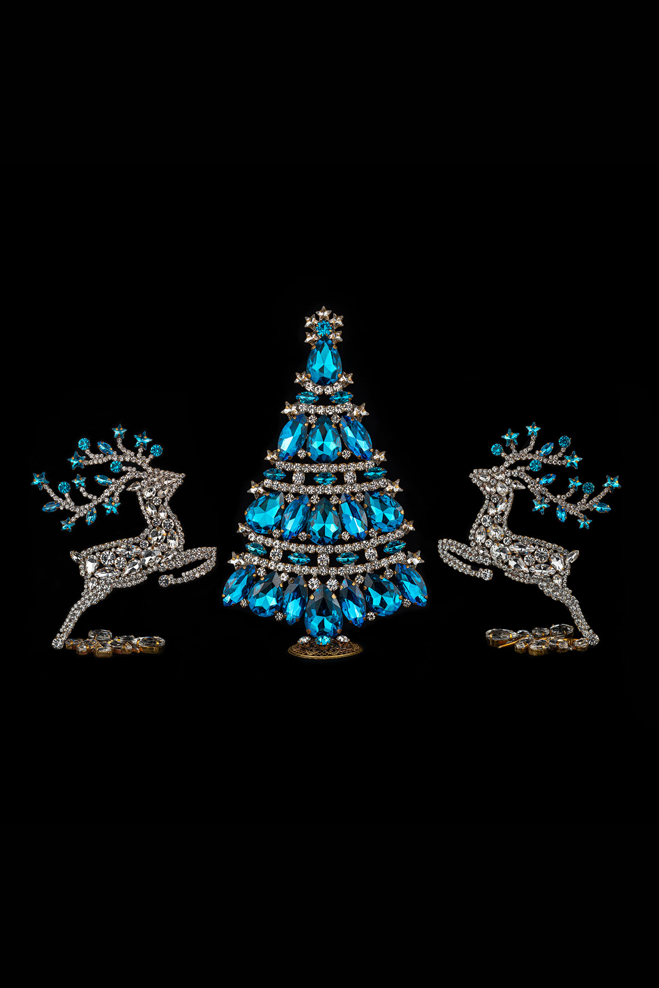 Christmas tree and reindeers from clear and blue rhinestones