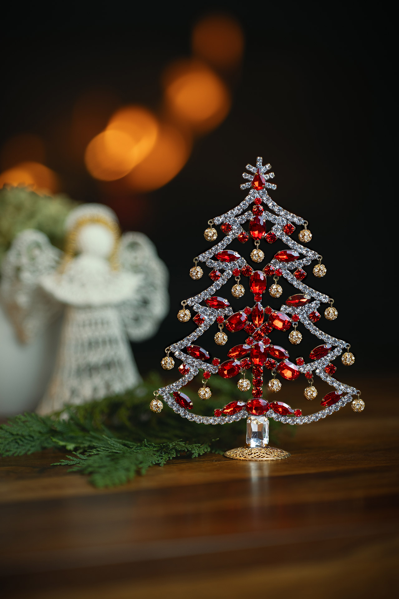 Crystalline Christmas tree decorated from red rhinestones