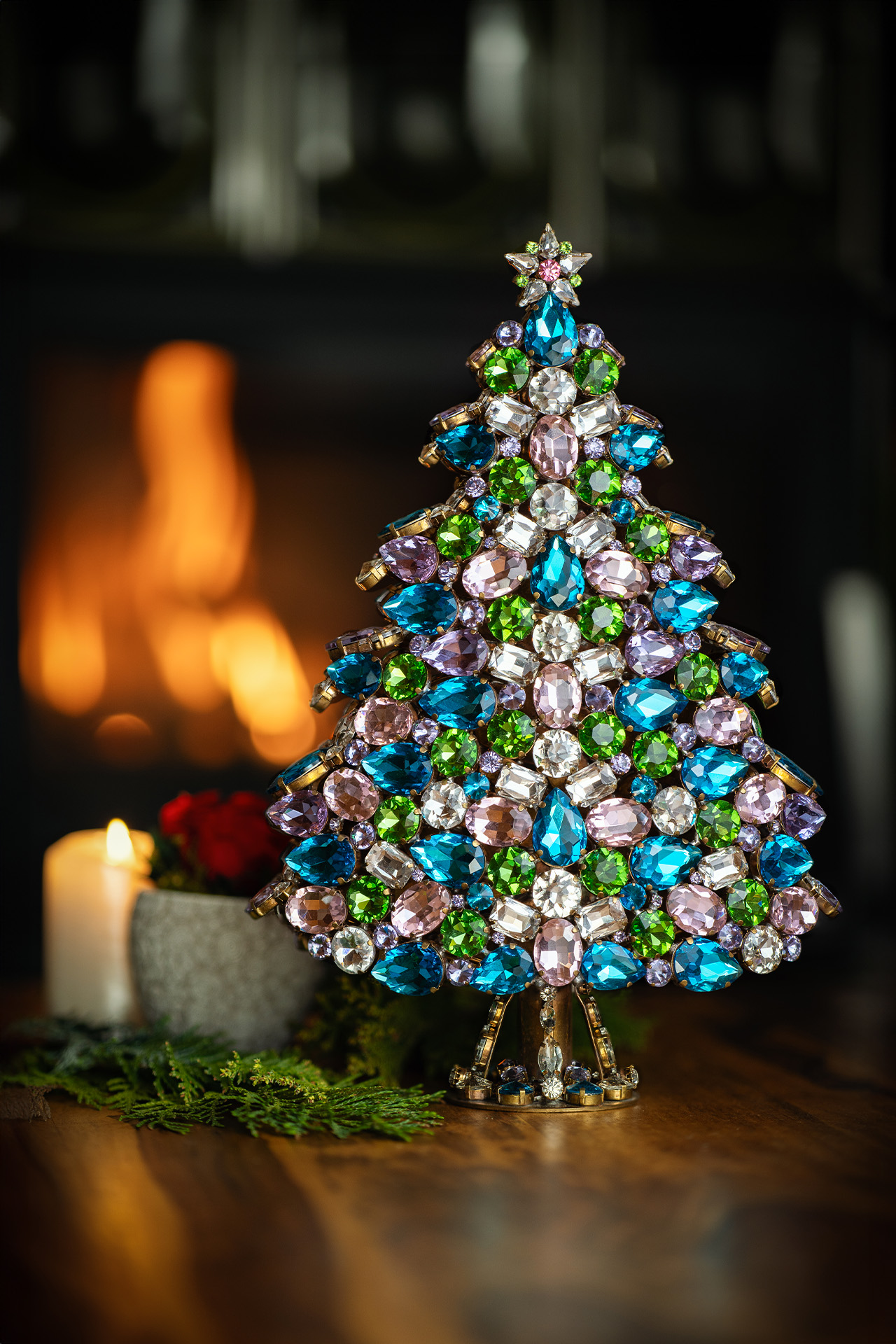 A rhinestone 3D Christmas tree decoration, crafted froma qua blue, pink and light green rhinestone crystals. 