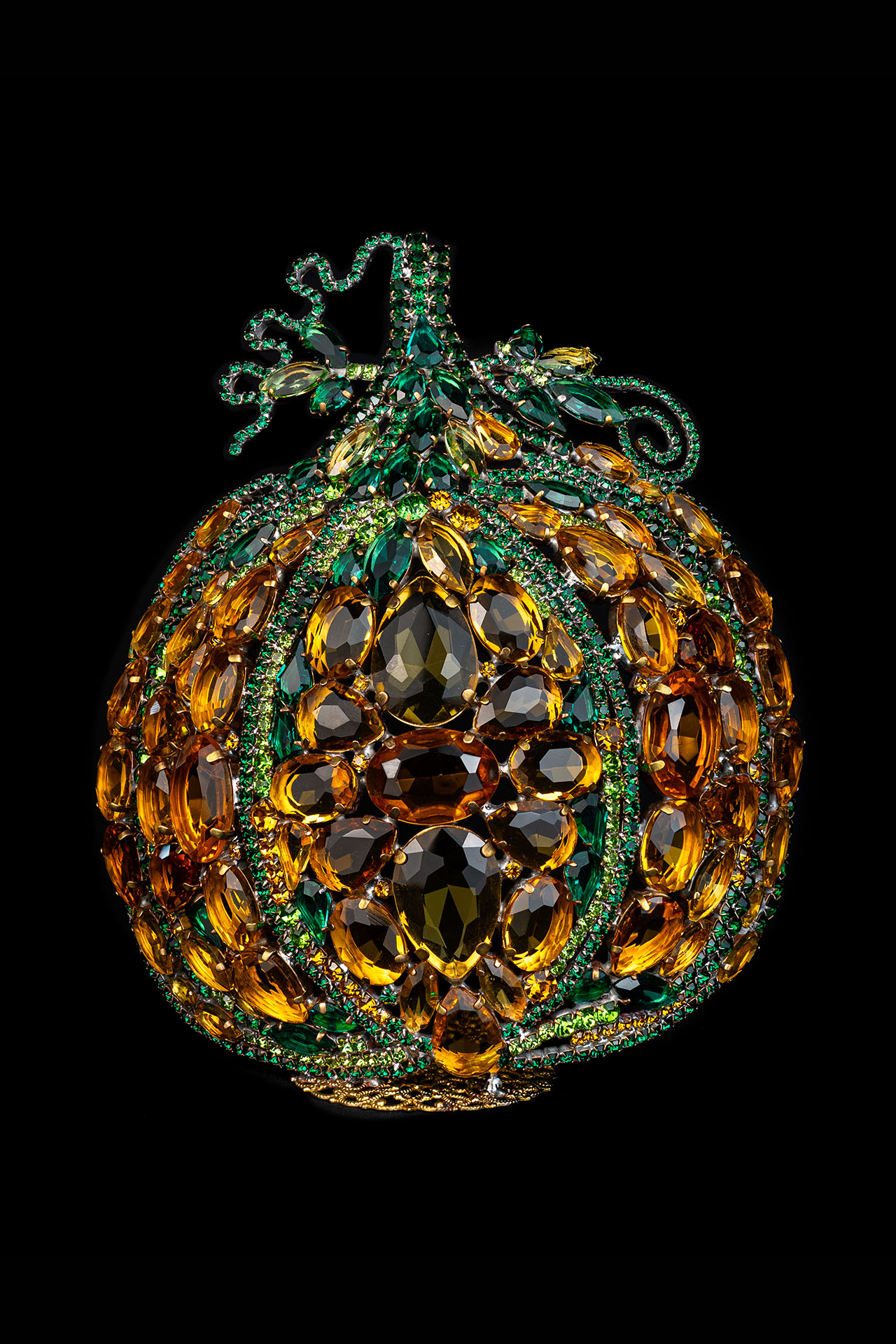 Bedazzled pumpkin decoration adorned with shimmering rhinestones