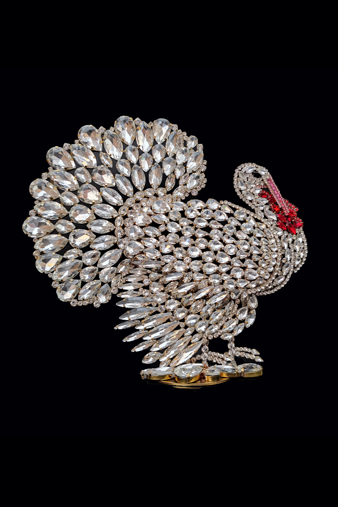 A luxurious, large turkey decoration for the table, crafted from clear rhinestone crystals.