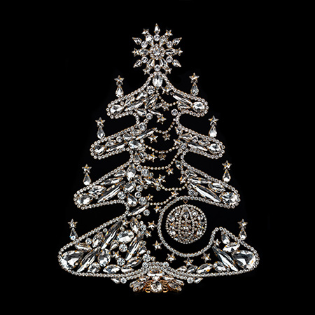 Glittering rhinestone Christmas tree in the shape of a gingerbread.