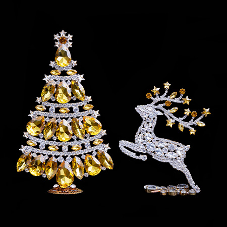 Christmas tree and reindeer from clear and yellow rhinestones.