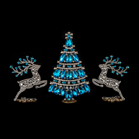 Christmas tree and reindeers from clear and blue rhinestones.