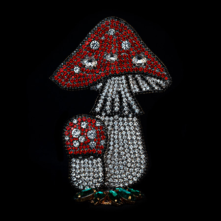 A  toadstools decorations made from red and white rhinestones.
